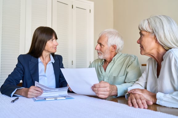A couple consults a move manager